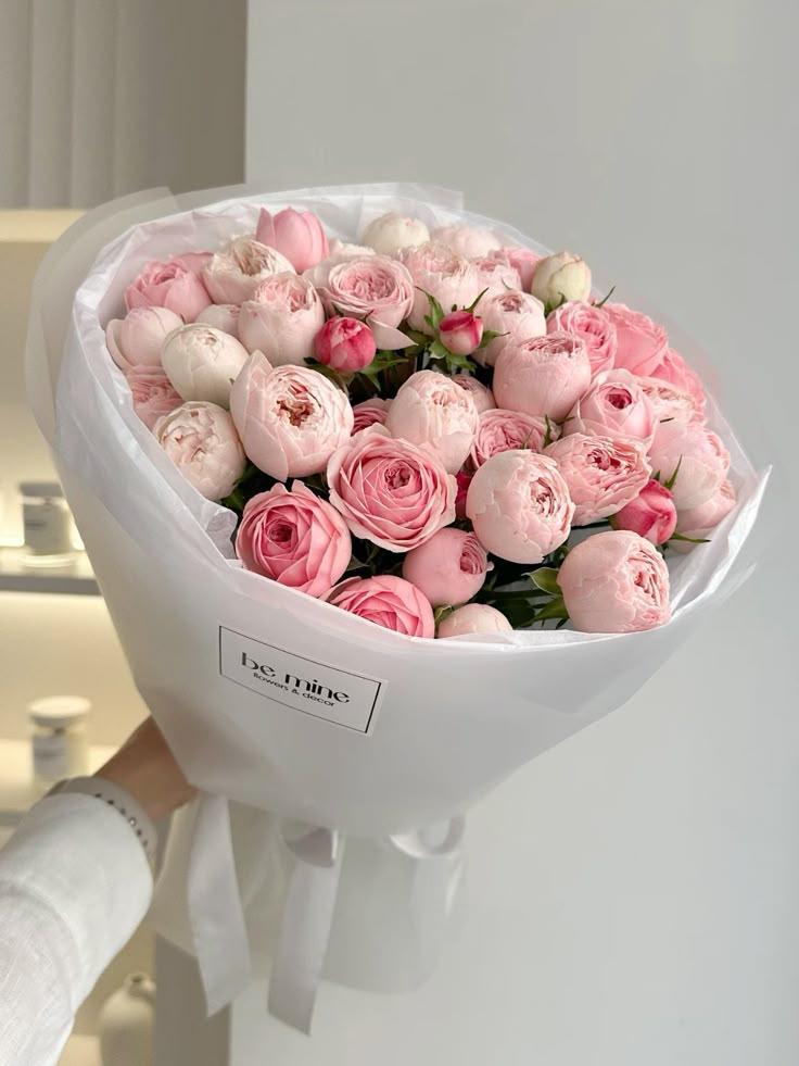 Professional floral arrangement in modern corporate setting